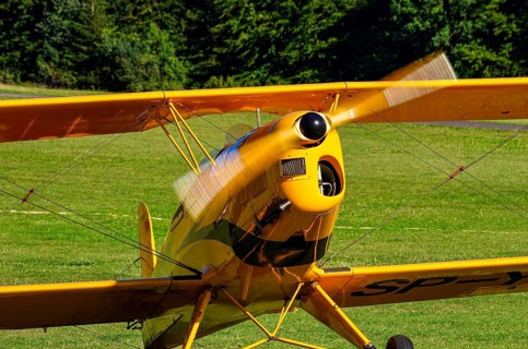 A biplane Bücker Bü 131 Jungmann with registration SP-YPZ during a flight demonstration as part of
