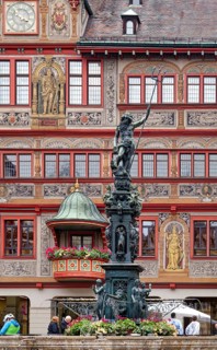 Market square with town hall and Neptune fountain with Neptune and trident from the Renaissance,