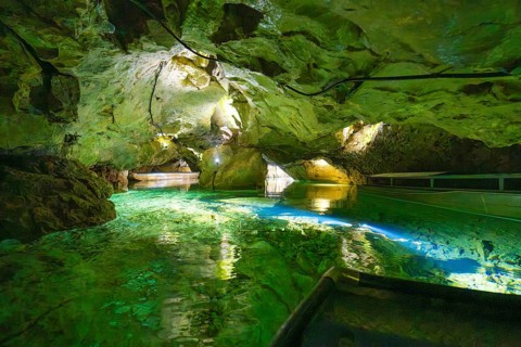 Impressive cave landscape with bluish-green water and mysterious atmosphere, Wimsener Höhle,