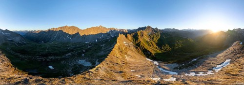 Sunrise 360° Alpine panorama, aerial view of Bachlenkenkopf, summit of the Großvenediger, Venediger