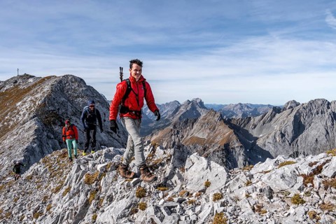 Hikers on steep Gradweg, hiking to Gamsjoch, eastern Karwendel, Tyrol, Austria