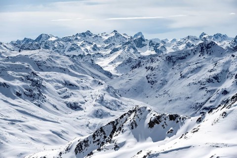 Mountain panorama with view of peaks of the Bernina Group, view from Piz Grialetsch in winter,