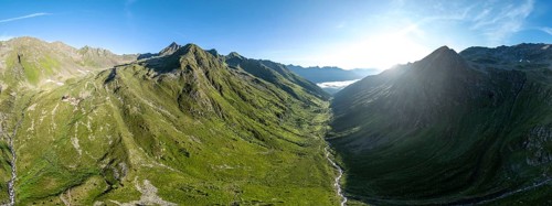 Alpine panorama, aerial view, Lasörlinghütte mountain hut in evening light, mountain landscape with