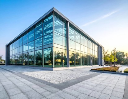 Modern architectural framework with glass and steel structure, glass facade with a greed of steel