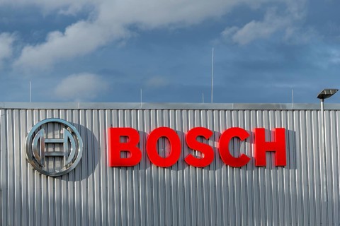 Bosch logo on a metal building façade under cloudy sky, Waiblingen, Baden-Württemberg, Germany