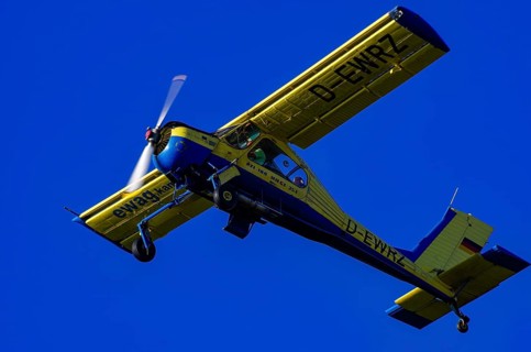 A PZL-104 Wilga-35A sport aircraft from Fliegerklub Kamenz with registration D-EWRZ during a flight