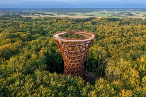 Aerial view over 45-meter-tall hyperboloid observation tower in forest near Gisselfeld monastery at