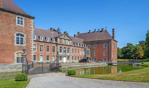 16th century Classicist Château de Franc-Waret in Louis XV style, moated castle in the village
