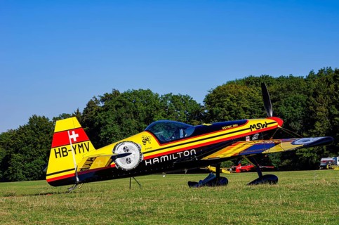 A Votec 351 sport aircraft from Swiss MSW Aviation AG with registration HB-YMV during a flight
