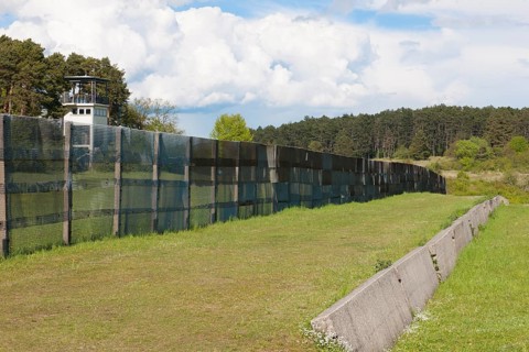 Original GDR border fence from 1970s with death strips on former zone border between West Germany
