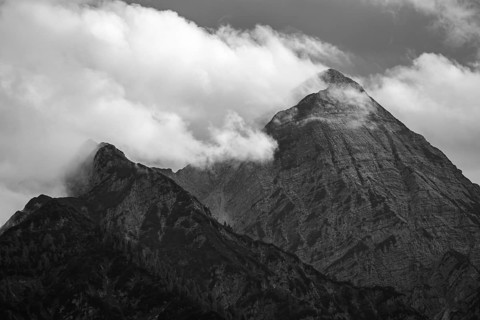 The cloudy summit of the Sonntaghorn, highest peak in the Chiemgau Alps, seen from Falkenstein near