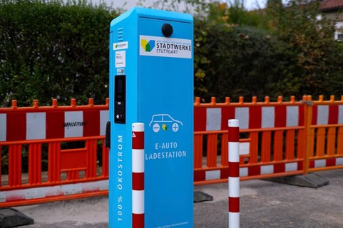 Parking lot with gas pump, EnBW charging station for electric cars, charging station, e-mobility,