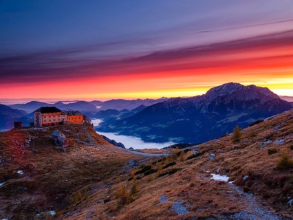 Watzmannhaus at dawn, fog in the valley, right Hoher Göll, Berchtesgaden National Park, Schönau am