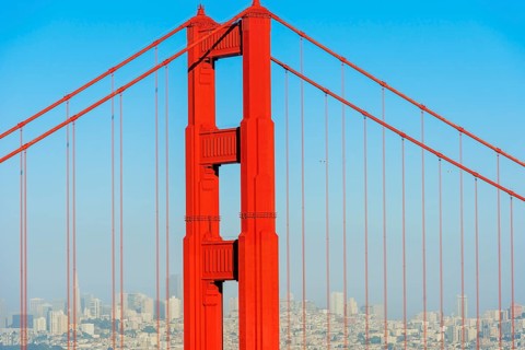 View of Golden Gate Bridge and financial district in the distance, San Francisco, California, USA