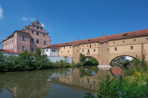 On the left, the Electoral Palace, with so-called city glasses, late medieval water gate building