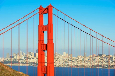 View of Golden Gate Bridge and financial district in the distance, San Francisco, California, USA