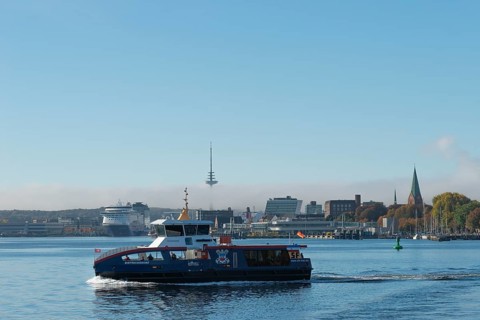 Kiel port, liner Dietrichsdorf on the fjord and Kiel-Oslo ferry on the east shore quay, ferry and
