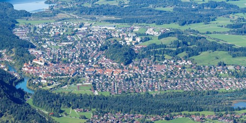 Panorama from Tegelberg, 1881m, on Füssen with historic old town, the Lech and behind it the