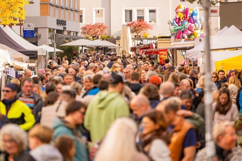 A lively market with numerous visitors and colorful stands, Urschelherbst street festival, Nagold,