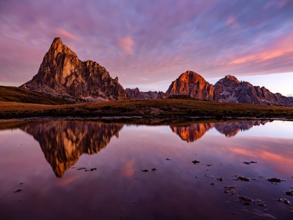 Alpine glow, reflection of the Ra Gusela and Tofane mountains at dawn, Passo di Giau, Giau Pass,
