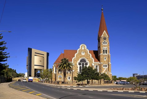 Evangelical Lutheran Christ Church from 1910, in the background the Independence Museum, Windhoek,