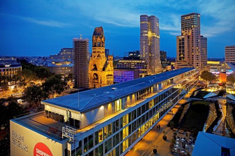 Bikini Berlin with Kaiser Wilhelm Memorial Church from an elevated position in the evening,
