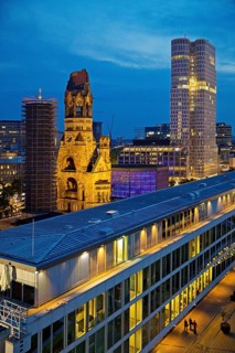 Bikini Berlin with Kaiser Wilhelm Memorial Church from an elevated position in the evening,