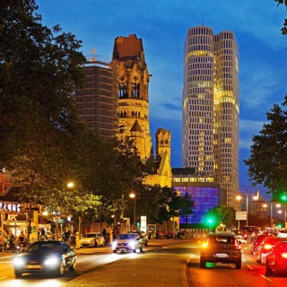 Budapester Straße with Kaiser Wilhelm Memorial Church and Upper West Tower in the evening,