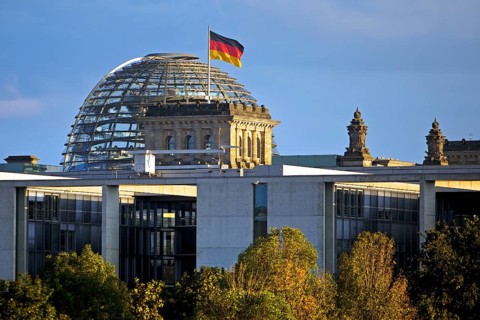 Reichstag dome with German flag, German Bundestag, government district, Berlin, Germany