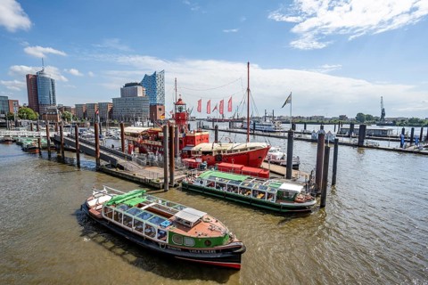 Boats at the city sports harbour in the Elbe, in the back Hafencity with Elbphilharmonie and