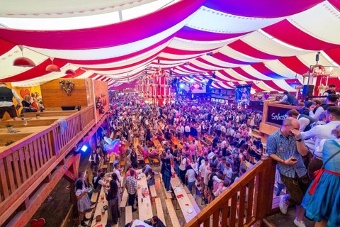 View of a crowded and festively decorated marquee during the Oktoberfest, Volksfest Cannstatter