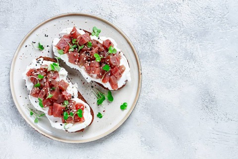 Sandwiches, rye bread with cream cheese, sliced tuna fillet with herbs, breakfast, homemade
