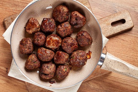 Fried meatballs in a frying pan, homemade, no people