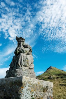 Statue of Virgin Mary. Roc de Courlande in Auvergne Volcanoes Regional Park. Puy de Dome. Auvergne