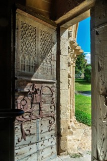 Entrance door of the romanesque church of Mailhat, Puy de Dome department, Auvergne-Rhone-Alpes,
