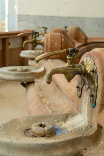 Vichy thermal city. Spring water taps in the Célesting spring (Source of Celestins), Allier