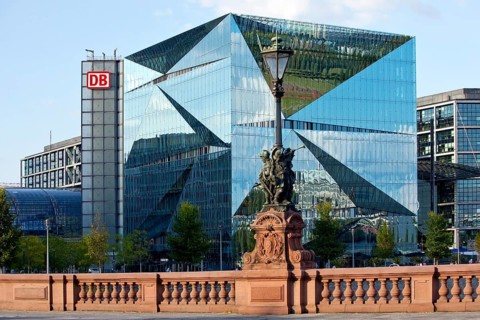 Historic Moltkebrücke with modern Cube Berlin, cube-shaped office building with glass façade