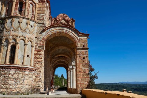 Pantanassa Monastery from the 15th century AD, An ancient archaic passageway in Greece against a