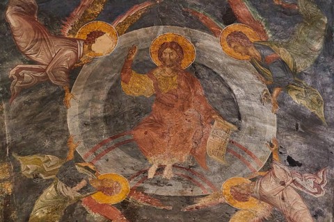 Pantanassa Monastery from the 15th century AD, Jesus in a fresco surrounded by angels on a circular