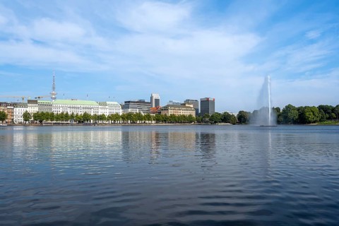 View over the Inner Alster with Alster fountain and television tower, Hamburg, Germany