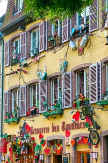 Decorated historic half-timbered house in the old town centre of Colmar, France