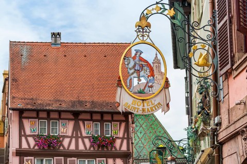 Guild sign in the old town centre of Colmar, France