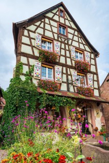 Decorated half-timbered house in the old town centre of Kaysersberg
