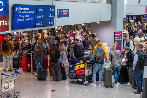 Full check-in hall, queues, Terminal B, many thousands of people take off on the first day of the