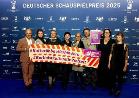 Johannes Heinrichs, Philipp Harpain, Wibke Behrens and others with a poster #KulturAbbauVerhindern