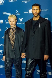 Eliob Demofike with partner Myat on the red carpet in front of the award ceremony at the Pullmann