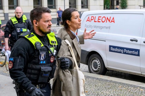 Arrest of a New Generation activist on Pariser Platz after a symbolic house search at the Stiftung