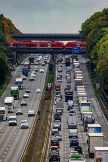 Local train crossing the A3 motorway between the Hilden junction and the Mettmann junction, view to
