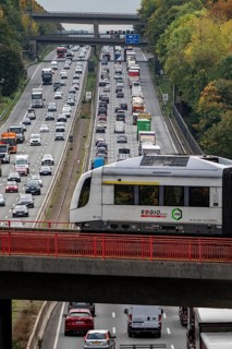 S-Bahn S28 crosses the A3 motorway between the Hilden junction and the Mettmann junction, view to