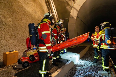 Firefighters prepare rescue in the tunnel with stretcher, firefighting exercise in the new tunnel